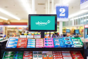 DOOH screen in grocery checkout lane